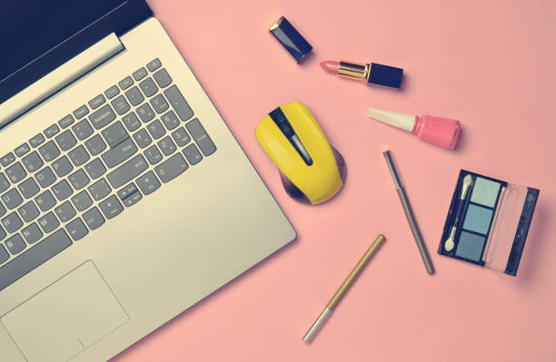 istock Modern laptop, wireless mouse, cosmetics, minimalism, top view, flat lay 1150512300