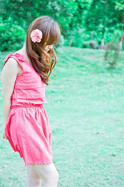 istock woman walking in park side view 115051332