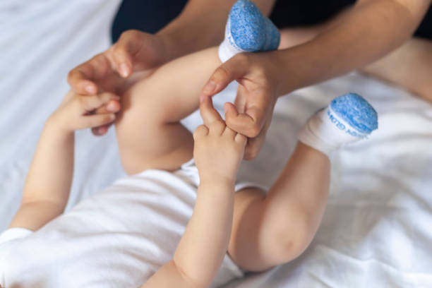 istock Angry 6 months baby boy crying in bed 1150513345