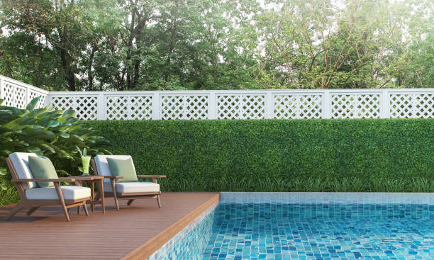 istock Swimming pool terrace in the garden 3d render 1150513996