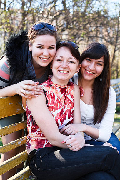 istock Portrait of three happy girlfriends 115051452