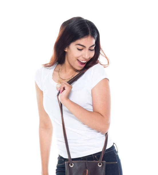 istock Cute latino female wearing tshirt and jeans 1150516042