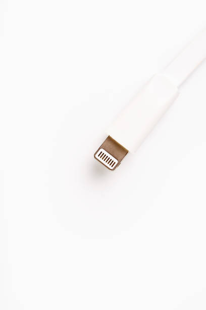 istock Connector lightning on a white background. This is a proprietary connector used to connect mobile devices to well-known host computers 1150516332
