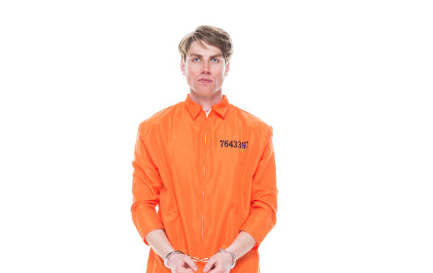 istock Male prisoner wearing handcuffs 1150518577