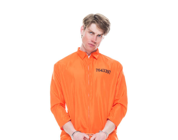 istock Male prisoner wearing handcuffs 1150518582