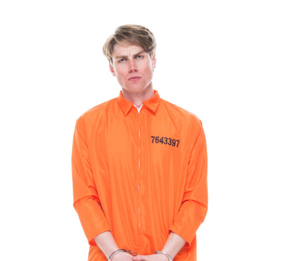 istock Male prisoner wearing handcuffs 1150518608