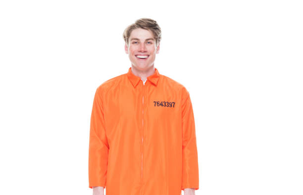 istock Male prisoner wearing orange jumpsuit 1150518796