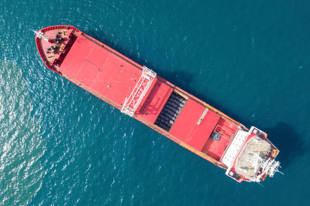 istock Red General cargo ship at sea, Aerial image. 1150519165
