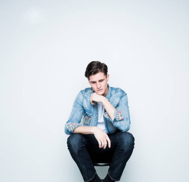 istock Handsome young man feeling depressed and sad 1150519306
