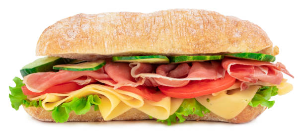 istock Ciabatta sandwich with lettuce, tomatoes prosciutto and cheese isolated on white background 1150522733