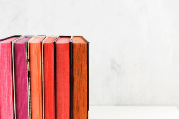 istock Pile of books with color stack on white background. Copy space 1150526906