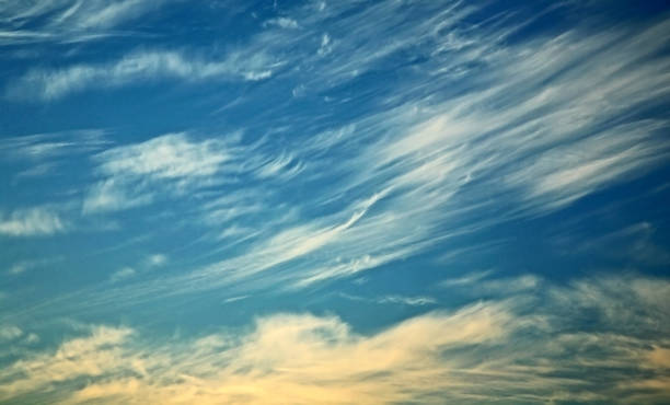 istock texture of blue sky with light white clouds watercolor 1150526968