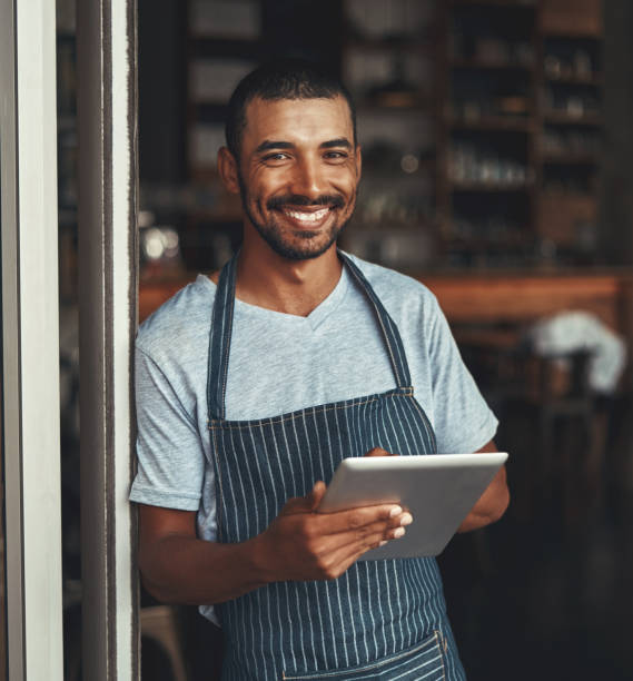 istock A young african cafe entrepreneur holding digital tablet 1150527029