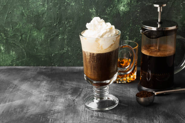 istock Irish coffee with whisky on dark background. Copy space. Food background 1150527222