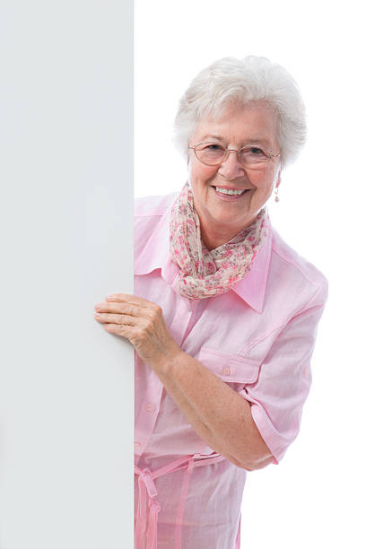 istock senior  woman with a cardboard 115052878