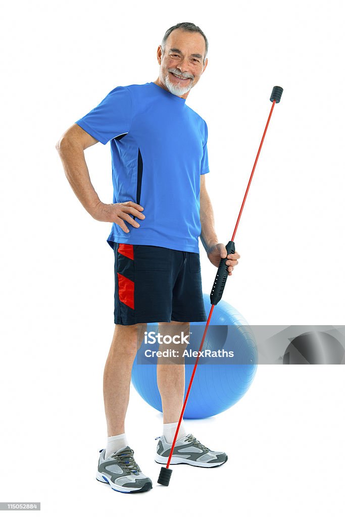 Active senior man senior doing exercises with a swing stick Cut Out Stock Photo