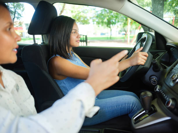istock Adolescent girl learning how to drive 1150533004