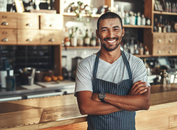 istock Friendly confident male owner at his cafe 1150533012