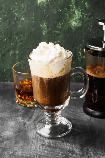 istock Irish coffee with whisky on dark background 1150534032