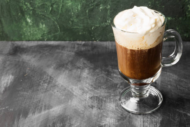 istock Irish coffee with whisky on dark background. Copy space. Food background 1150534034