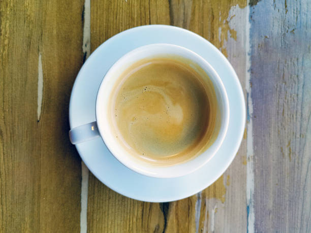 istock white cup of hot coffee on table 1150537353