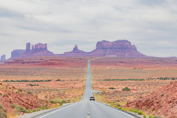 istock Monument Valley highway with car on open road 1150538296