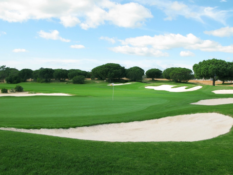 Green and bunkers od a golf course