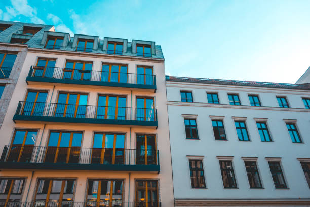 istock white and orange modern houses in a row 1150543463