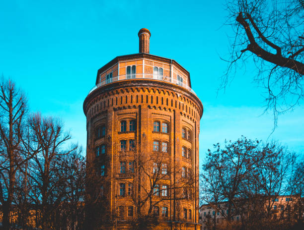 water tower at berlin, prenzlauer berg - framed by trees
