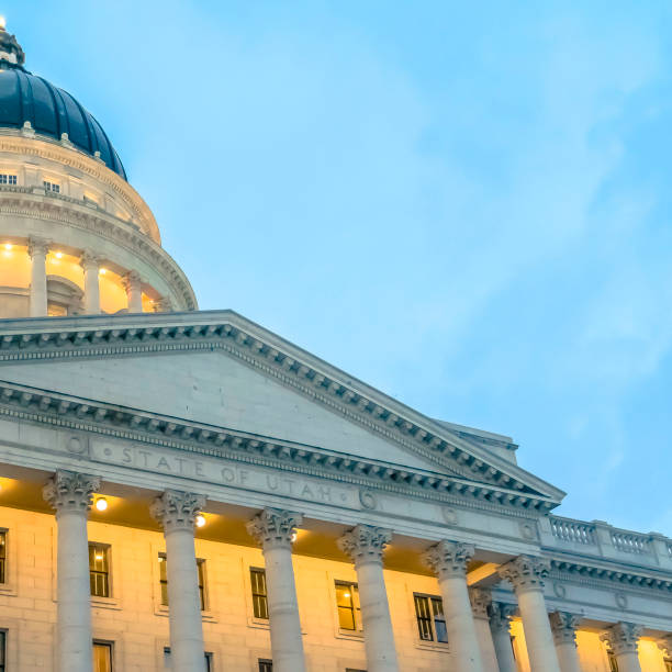 istock Clear Square The magnificent Utah State Capital Building with cloudy blue sky background 1150549180