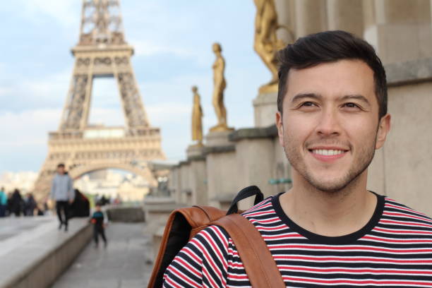 Man in the Eiffel Tower, Paris Man in the Eiffel Tower, Paris. exchange student stock pictures, royalty-free photos & images