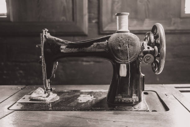 istock Old vintage sewing machine in an old house. 1150550187