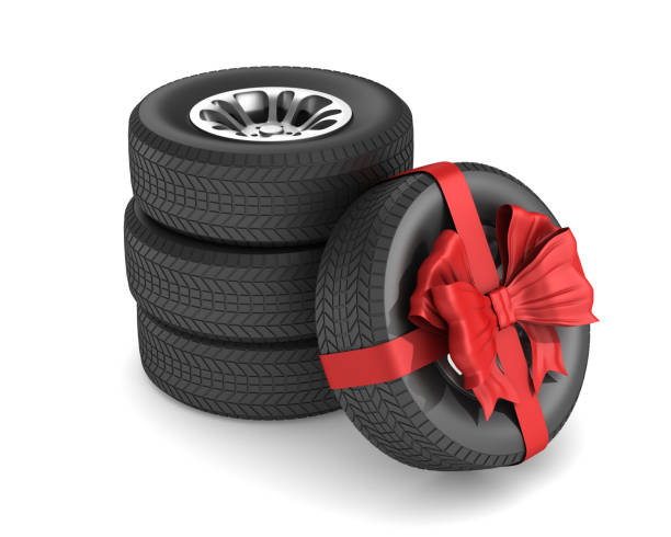 istock tire with red bow on white background. Isolated 3D illustration 1150552461