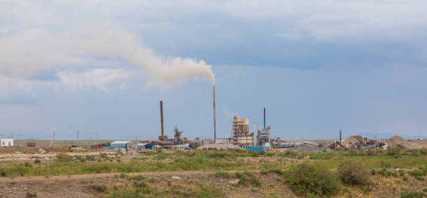 istock global warming, industrial chimney plant 1150552630