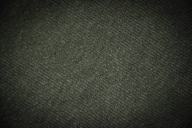 istock grey ribbed corduroy background with vignette 1150553873