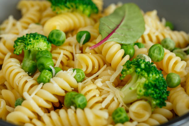 istock Pasta with broccoli and green peas 1150554730