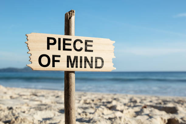 istock Piece Of Mind Wooden Pole On The Sandy Beach 1150556685