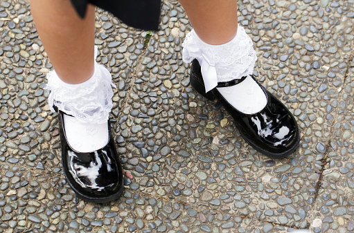 Patent leather shoes with white socks