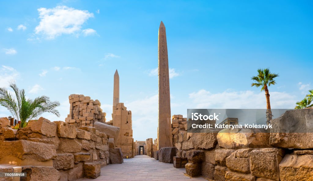 Obelisks in Karnak temple Obelisks and ruins of Karnak temple in Luxor at sunrise, Egypt Egypt Stock Photo