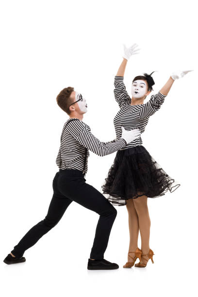 istock Smiling mimes in striped shirts. 1150559914
