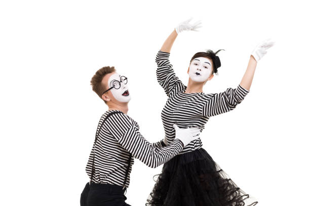 istock Smiling mimes in striped shirts. 1150559922