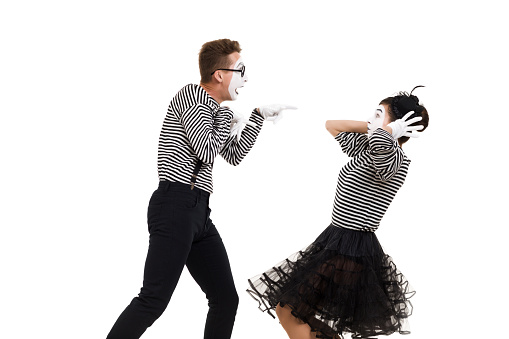 mime couple quarrels and shouts at each other isolated on white background