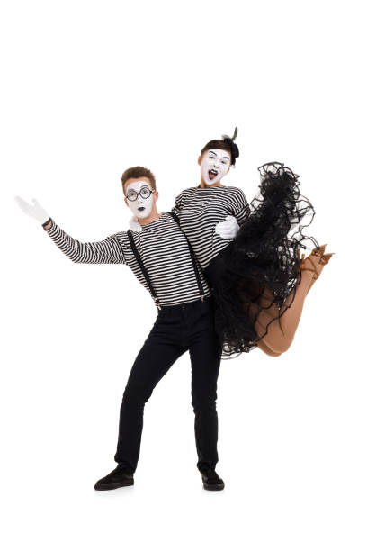istock Smiling mimes in striped shirts. 1150559941