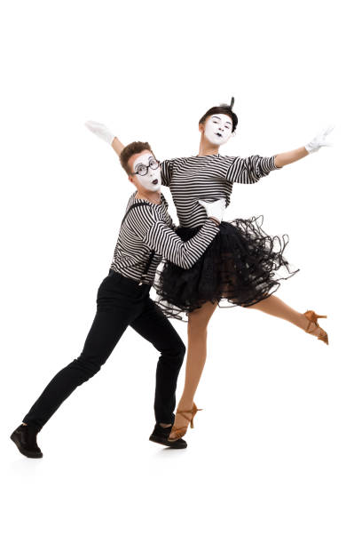 istock Smiling mimes in striped shirts. 1150559951