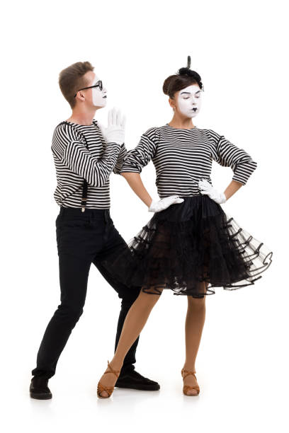 istock Smiling mimes in striped shirts. 1150559962