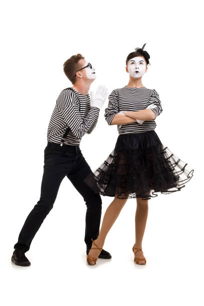 istock Smiling mimes in striped shirts. 1150559977