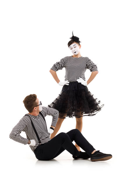 istock Smiling mimes in striped shirts. 1150559986