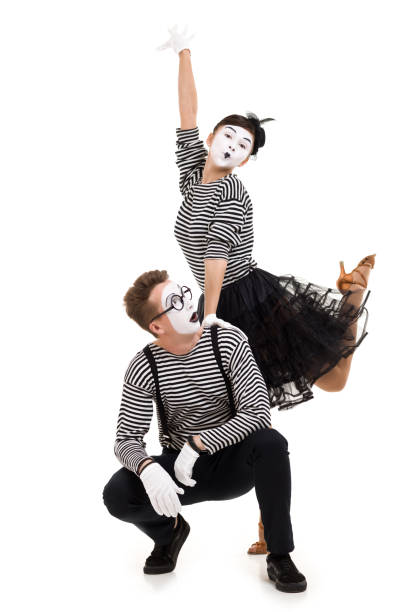 istock Smiling mimes in striped shirts. 1150559989