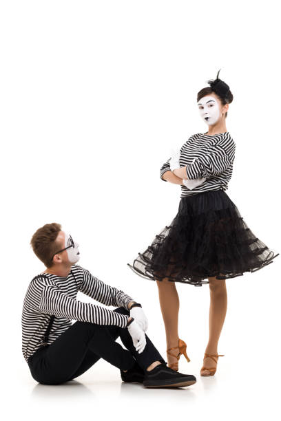 istock Smiling mimes in striped shirts. 1150559991