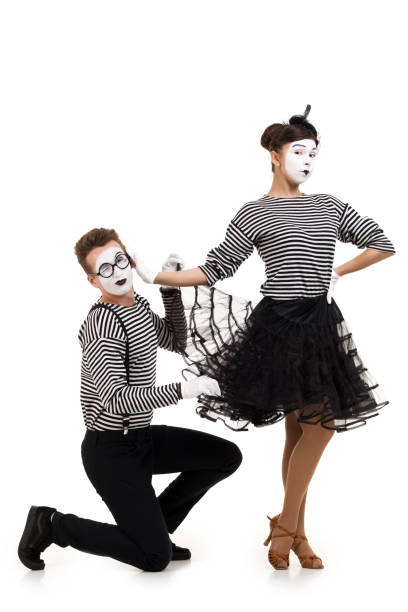 istock Smiling mimes in striped shirts. 1150560008